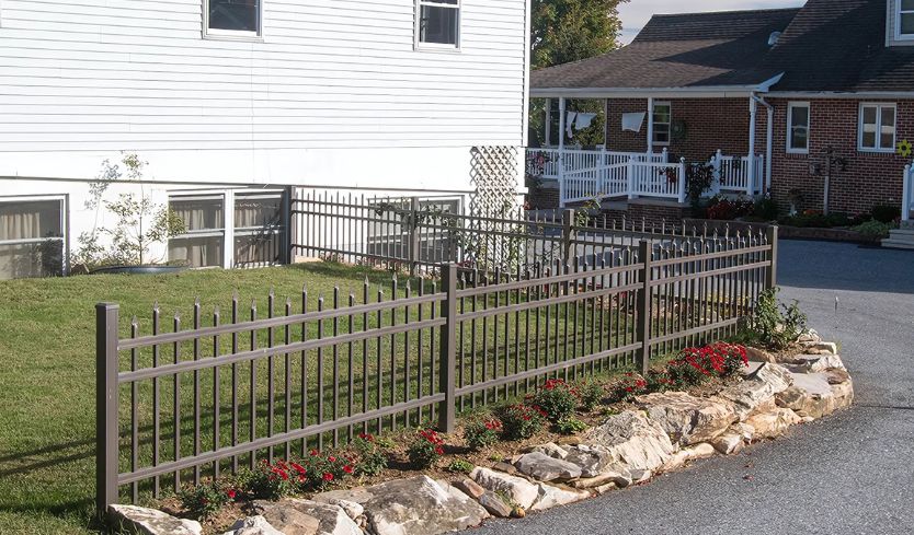 small picket fences and this short metal fence